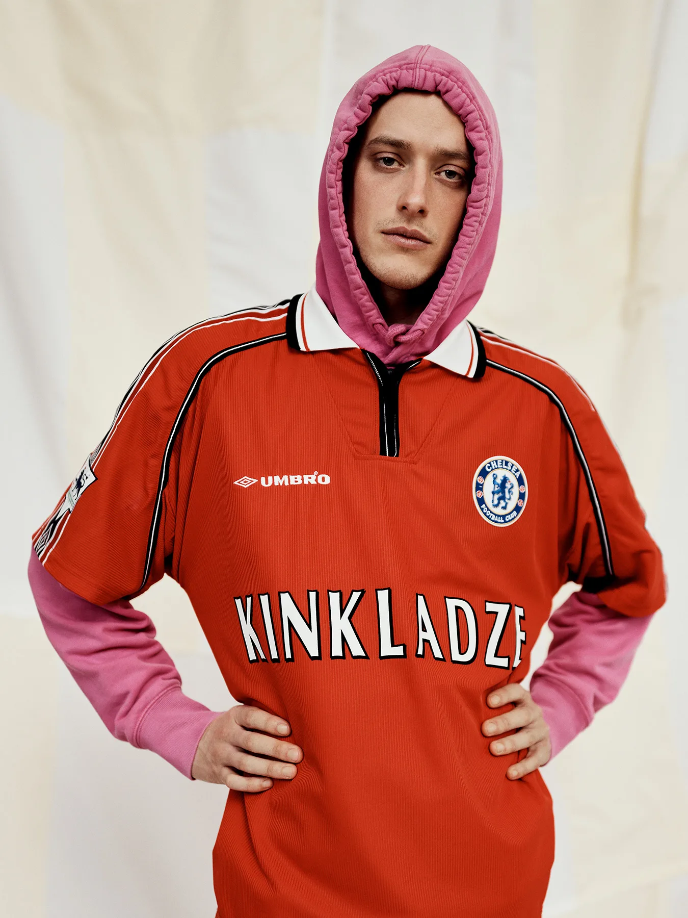 Neil Bedford photographs a male model in football shirts made in error. Designed to create debate online.
