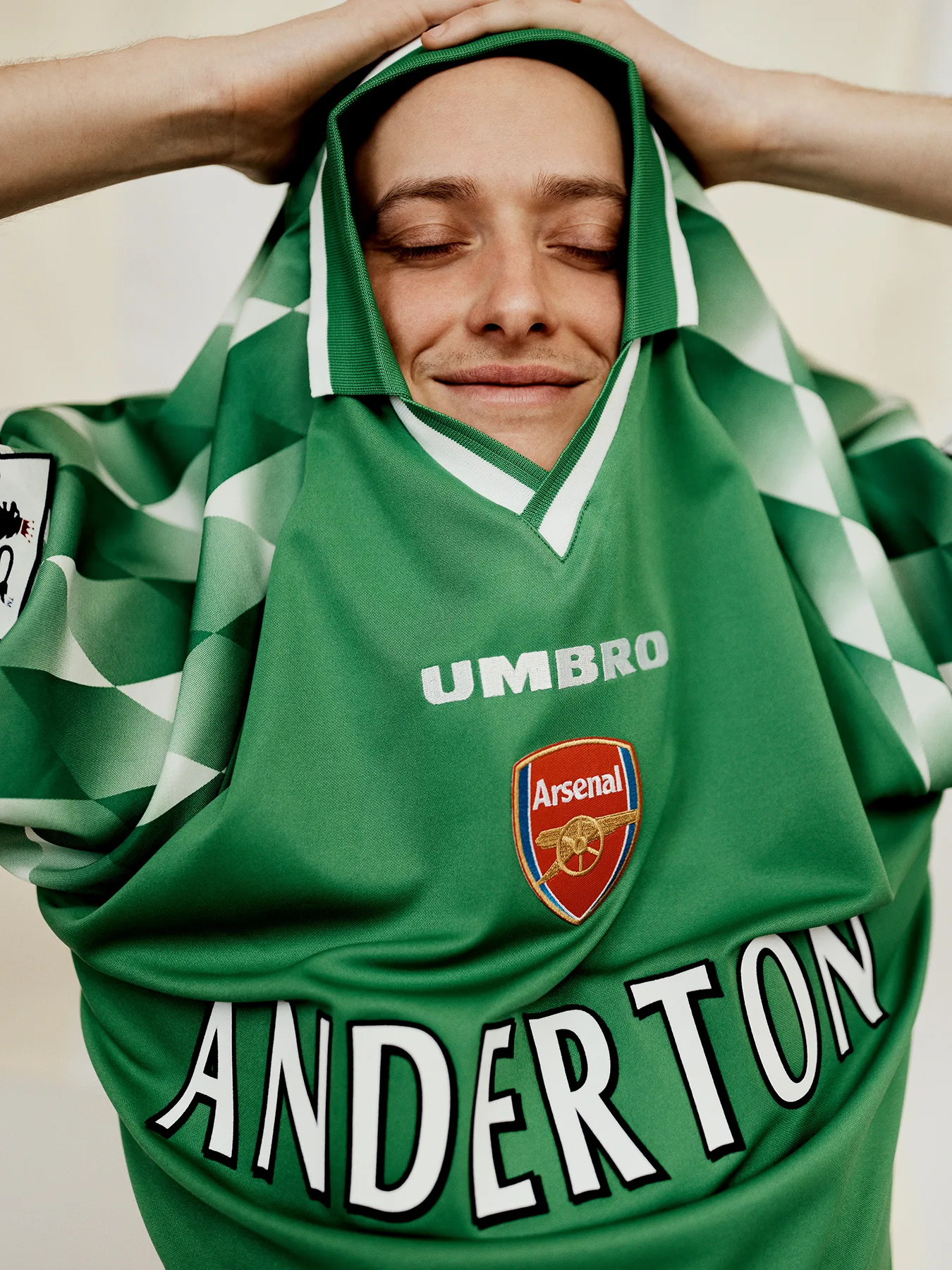 Neil Bedford photographs a male model in football shirts made in error. Designed to create debate online.