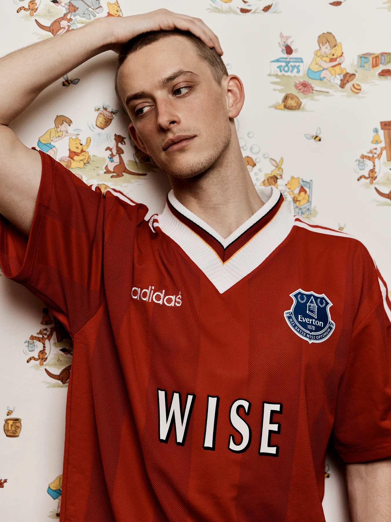 Neil Bedford photographs a male model in football shirts made in error. Designed to create debate online.