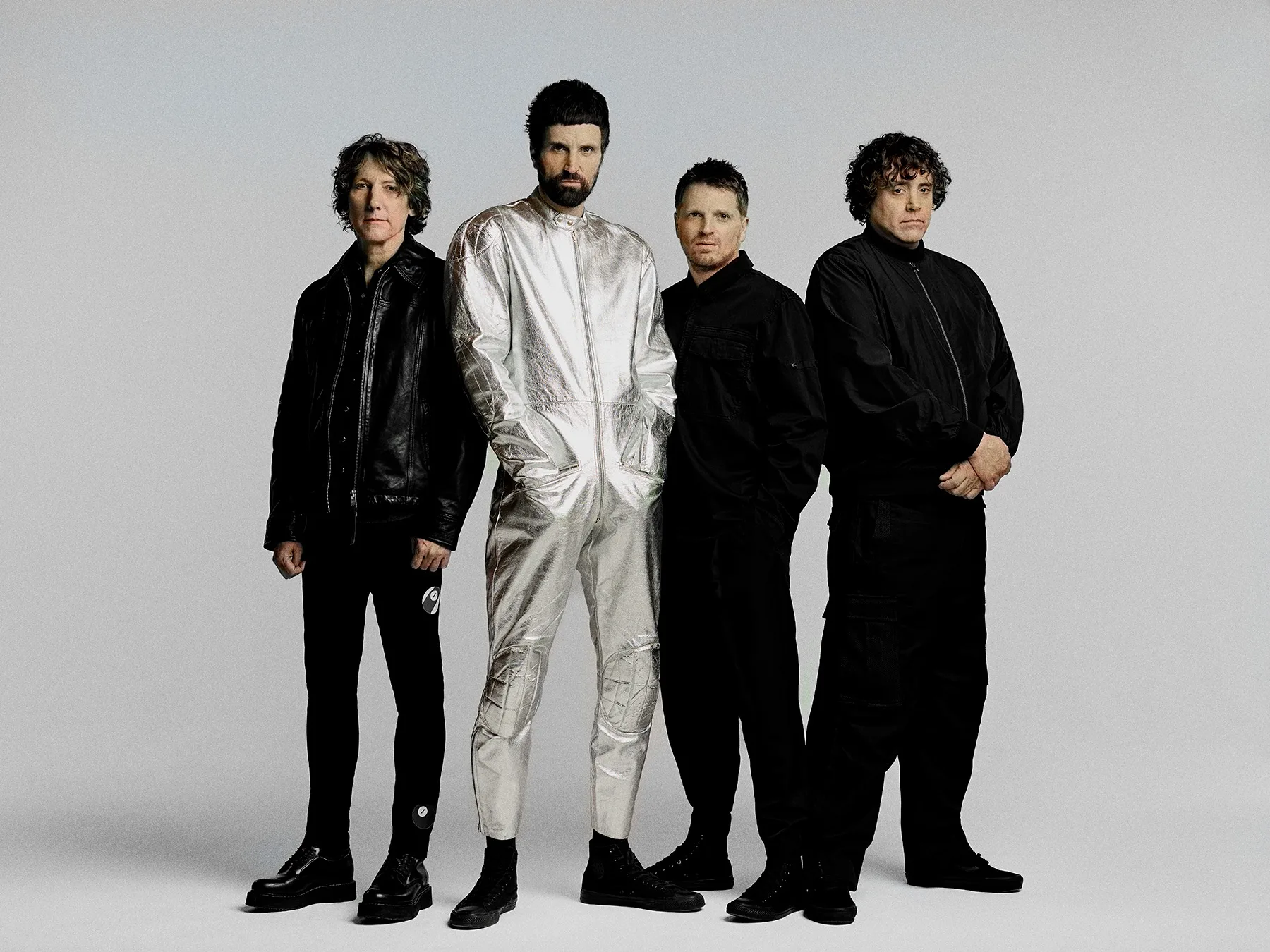 Press photographs for Kasabian. Kasabian are signed with Columbia and Sony music. Black and white photographs that have been digitally recoloured.