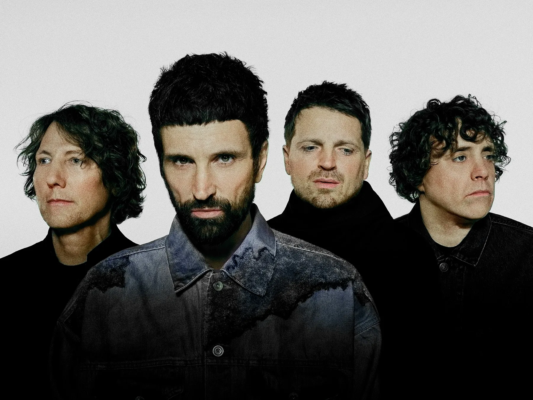 Press photographs for Kasabian. Kasabian are signed with Columbia and Sony music. Black and white photographs that have been digitally recoloured.