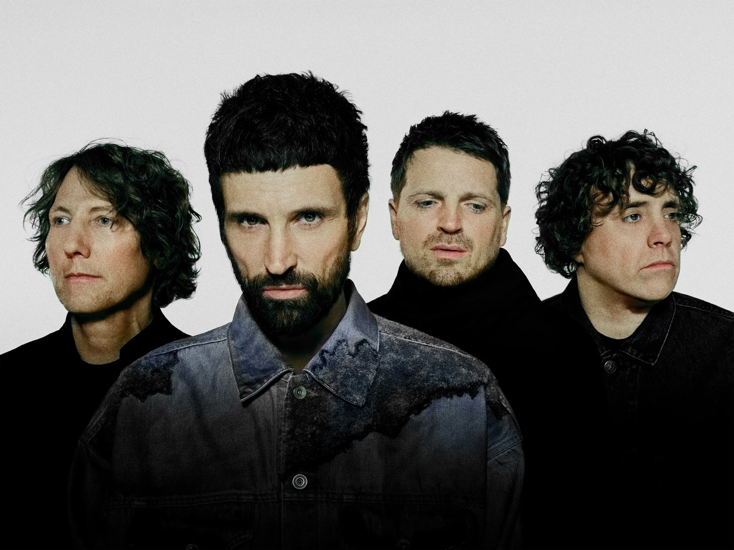 Press photographs for Kasabian. Kasabian are signed with Columbia and Sony music. Black and white photographs that have been digitally recoloured.