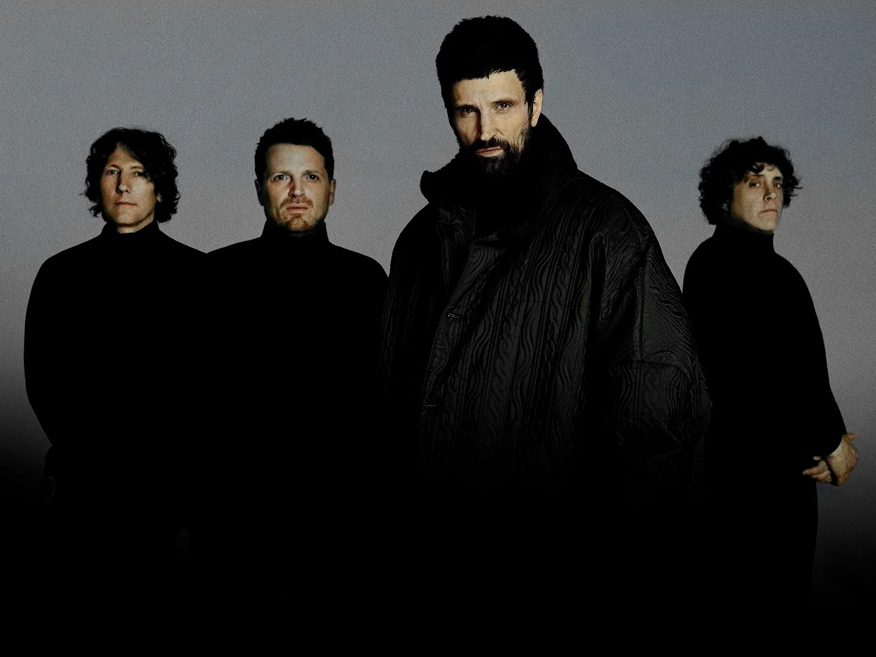 Press photographs for Kasabian. Kasabian are signed with Columbia and Sony music. Black and white photographs that have been digitally recoloured.